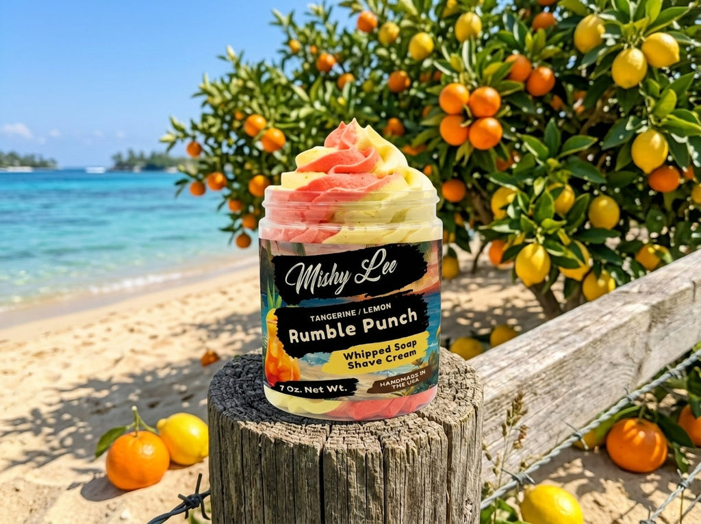Whipped soap and shave cream jar with tangerine lemon label and pink-yellow swirl top
