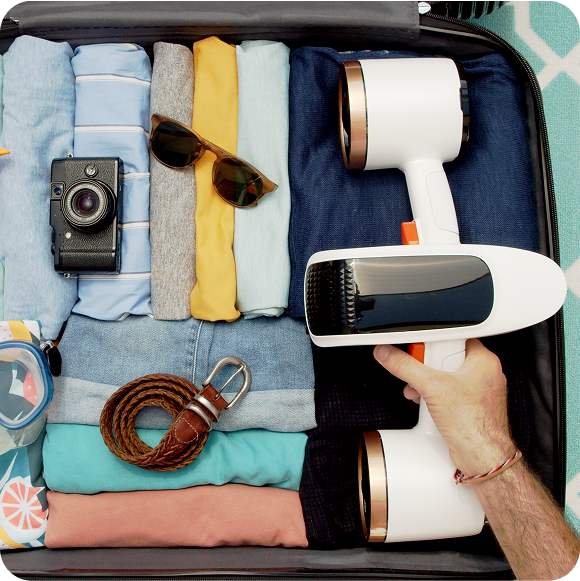 Underwater camera kit with white device and accessories in open travel case