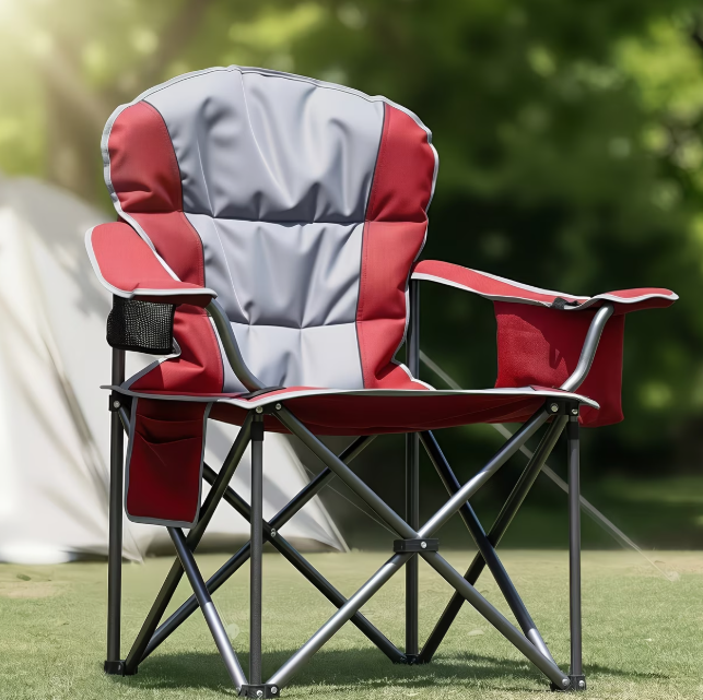 Red and grey folding camping chair with padded seat and backrest