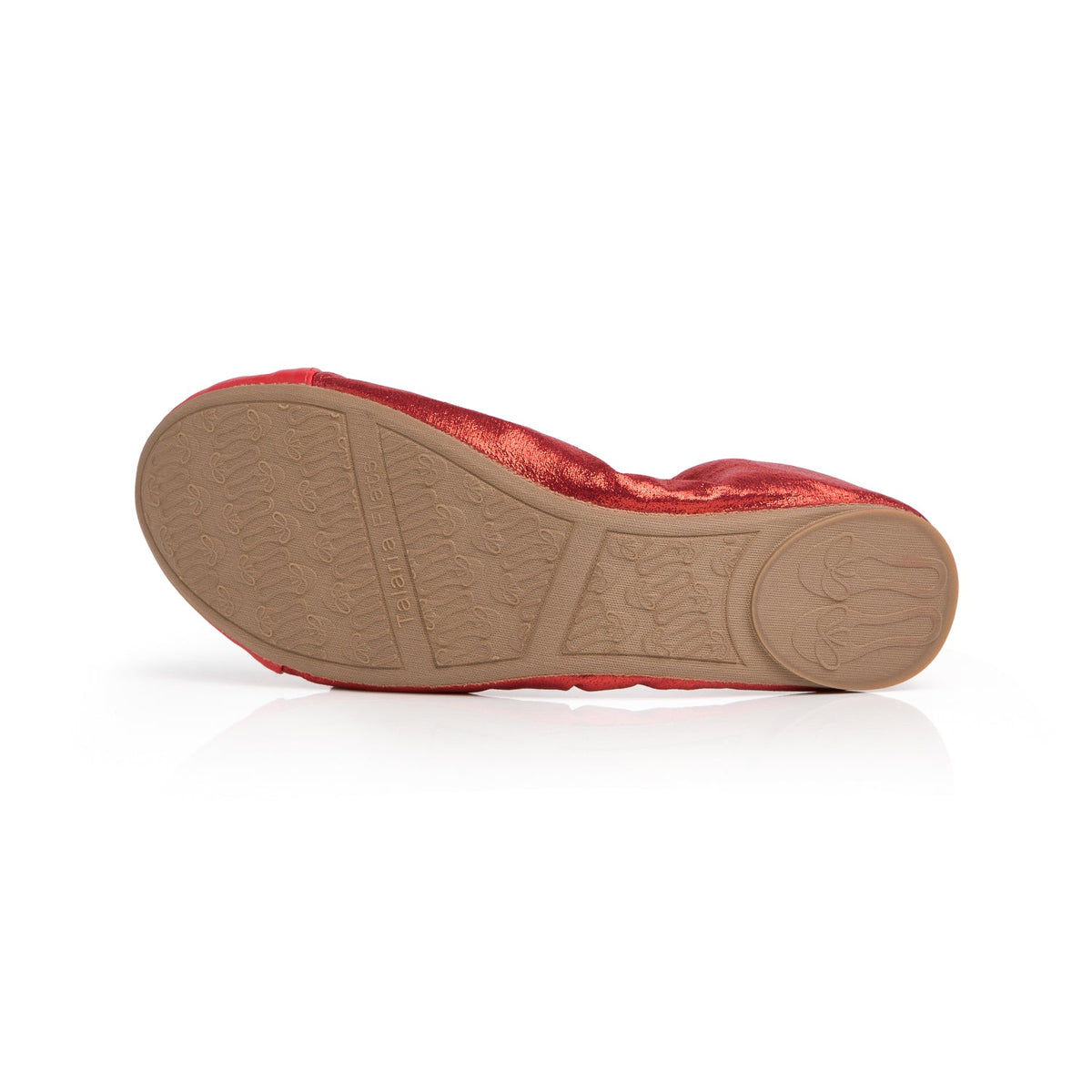 Ruby red flats outsole view with beige tread and cushioned insole edge.