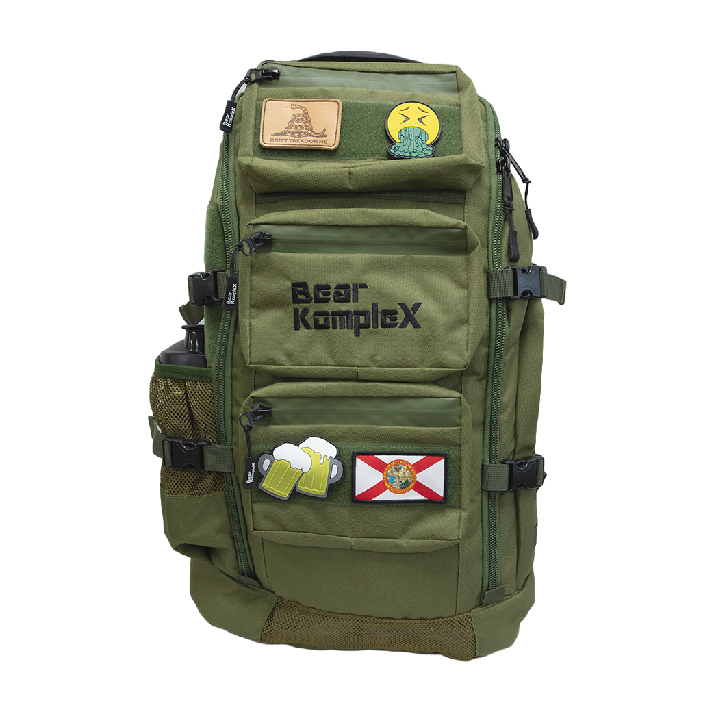 BKX military backpack in military green with front zip pockets and MOLLE side straps