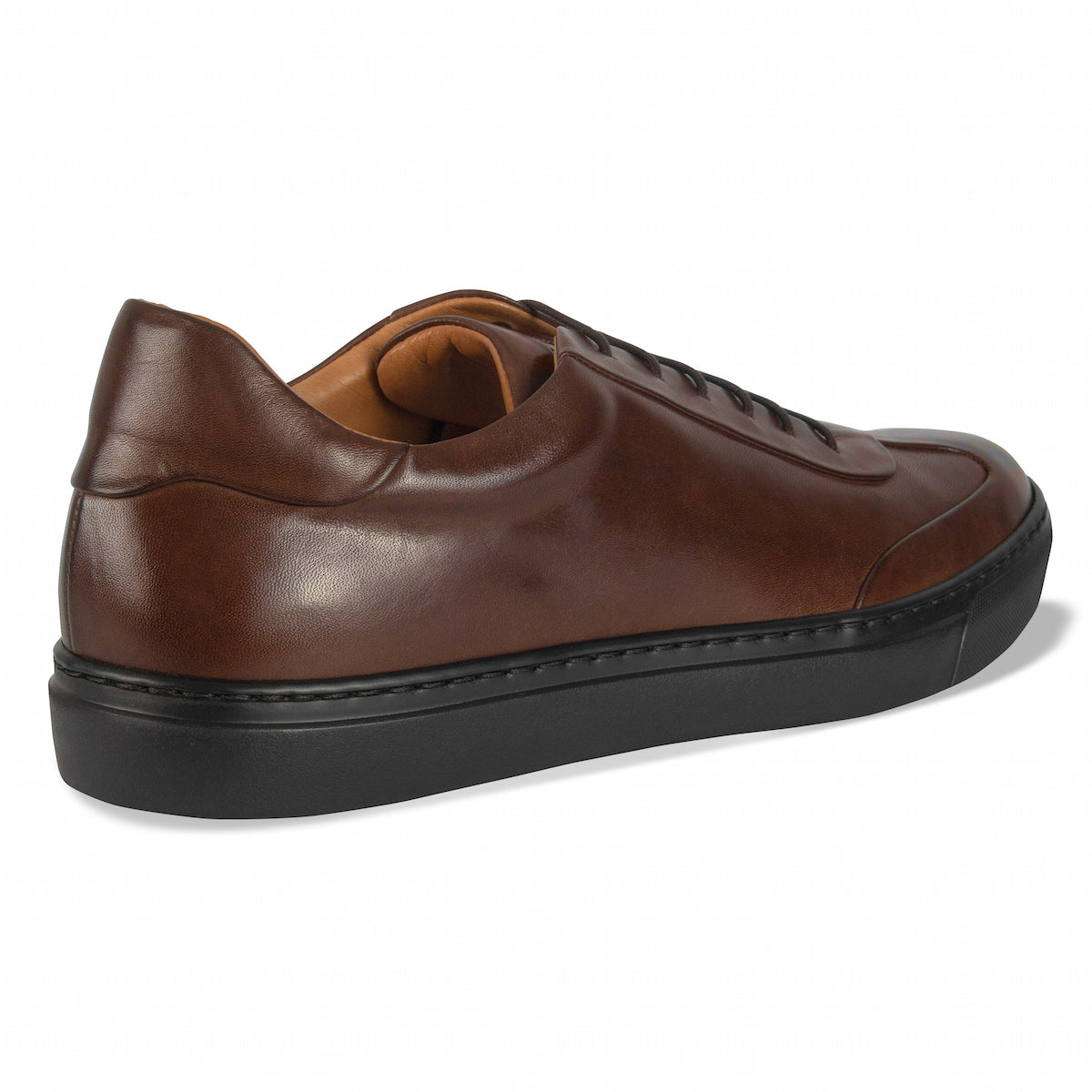 Brown leather lace-up oxford shoes, side view with black low-profile sole