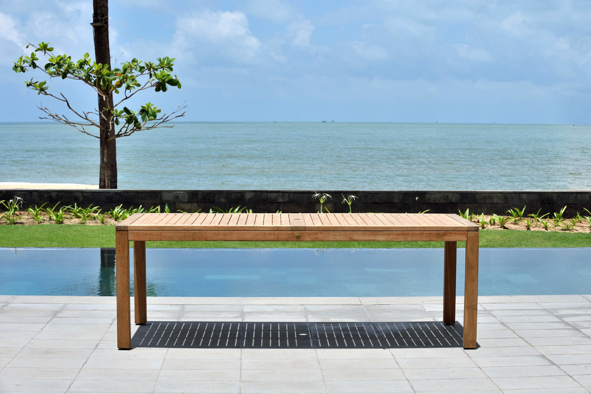 Rectangular teak dining table with lower slatted shelf base for outdoor use