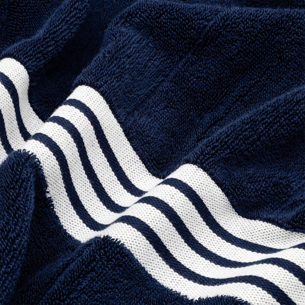 Navy cotton towel detail with thick white stripe pattern