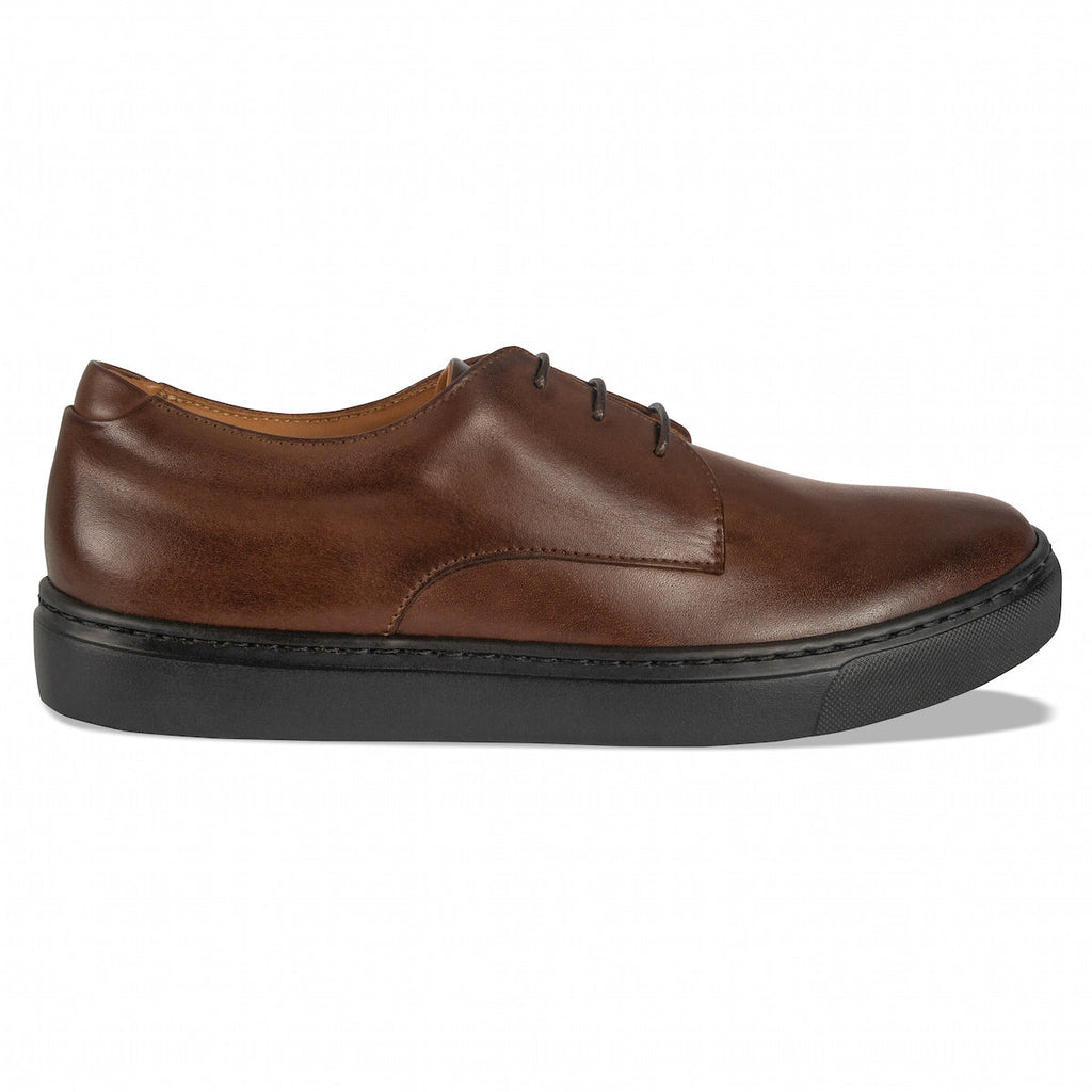 Men's brown leather lace-up oxford shoe with dark rubber sole and stitching detail