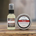 Hand sanitizer spray bottle and round lotion bar tin