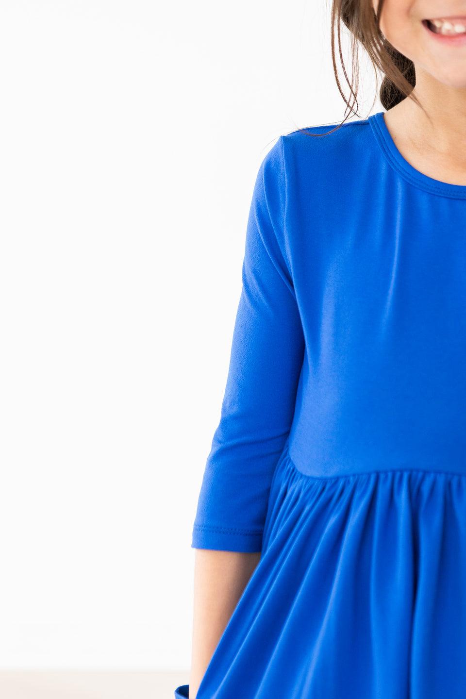 Royal blue 3/4 sleeve twirl dress with gathered skirt detail