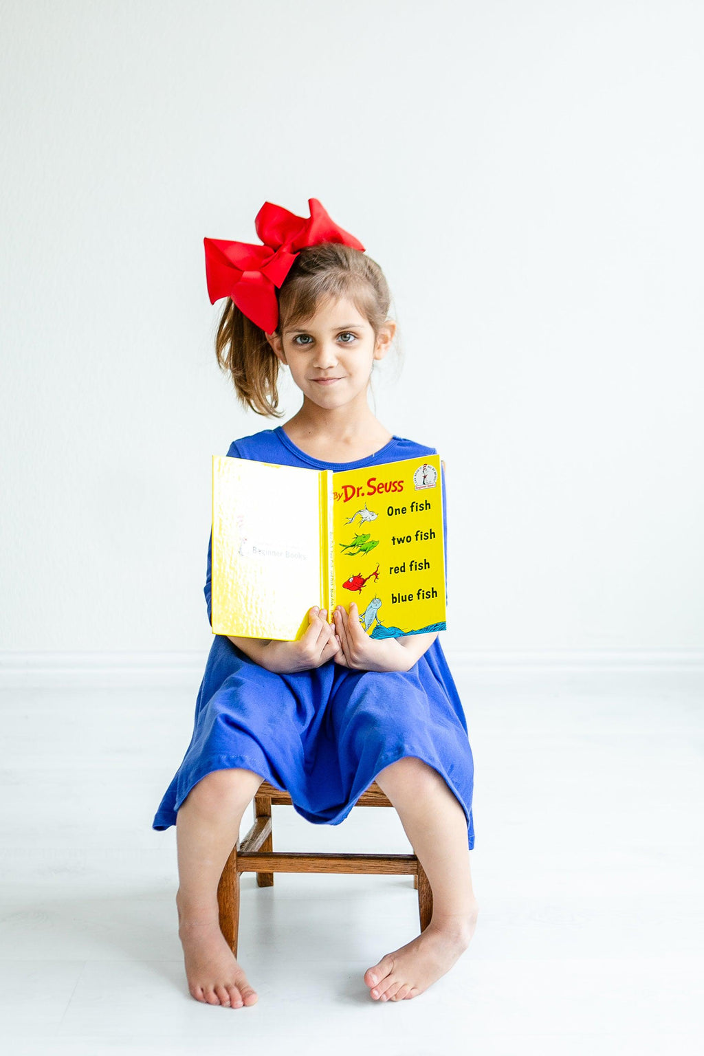 Royal blue pocket twirl dress with 3/4 sleeves and gathered skirt