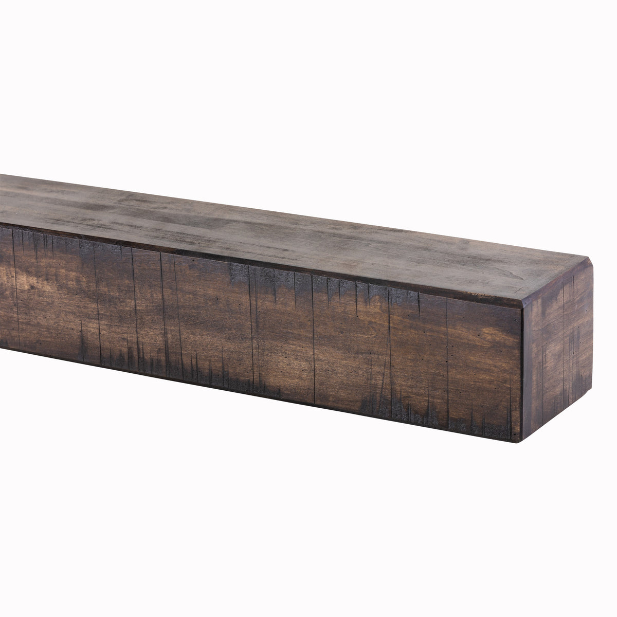 Fireplace mantel shelf in dark brown reclaimed-wood style with visible grain and plank seams.