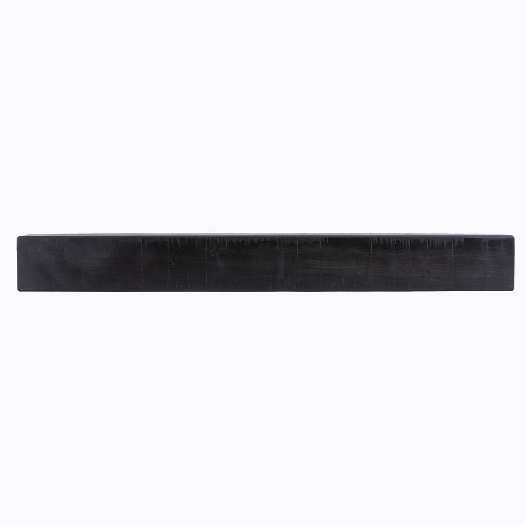 Fireplace mantel shelf in midnight black with smooth top and lightly distressed surface.