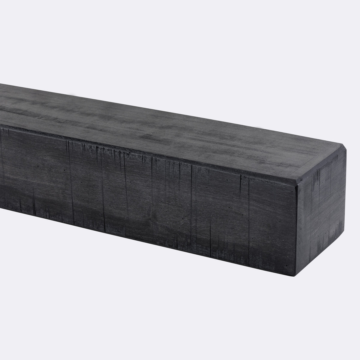 Dark gray rustic fireplace mantel shelf, rectangular beam with squared ends