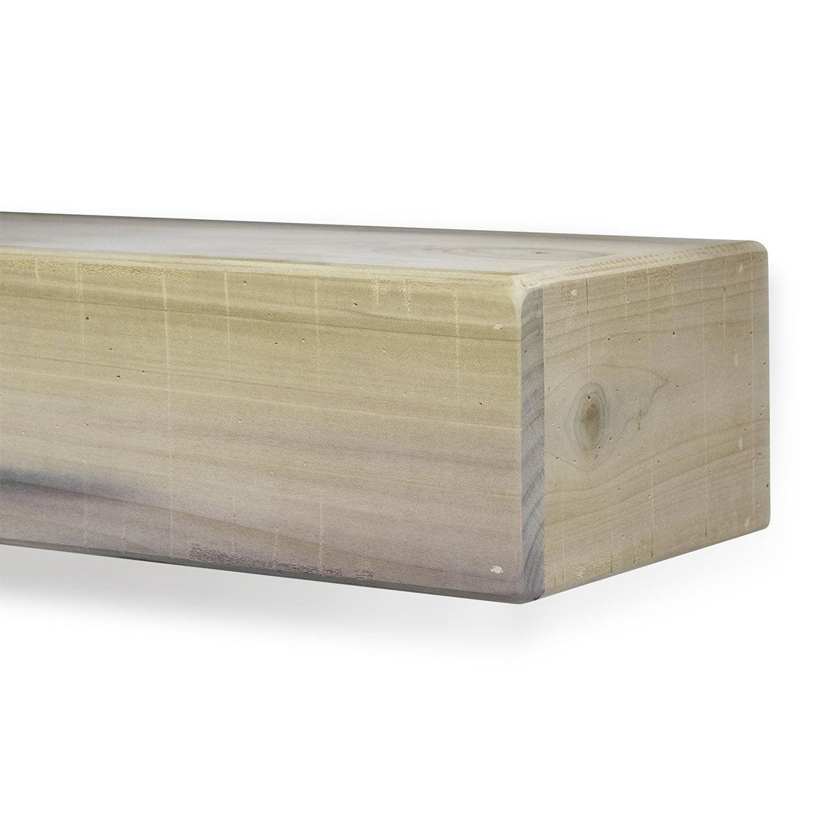 Unfinished light wood fireplace mantel shelf with squared ends and visible grain