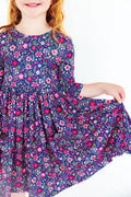 Floral twirl dress with 3/4 sleeves and side pockets, navy with pink and white flowers