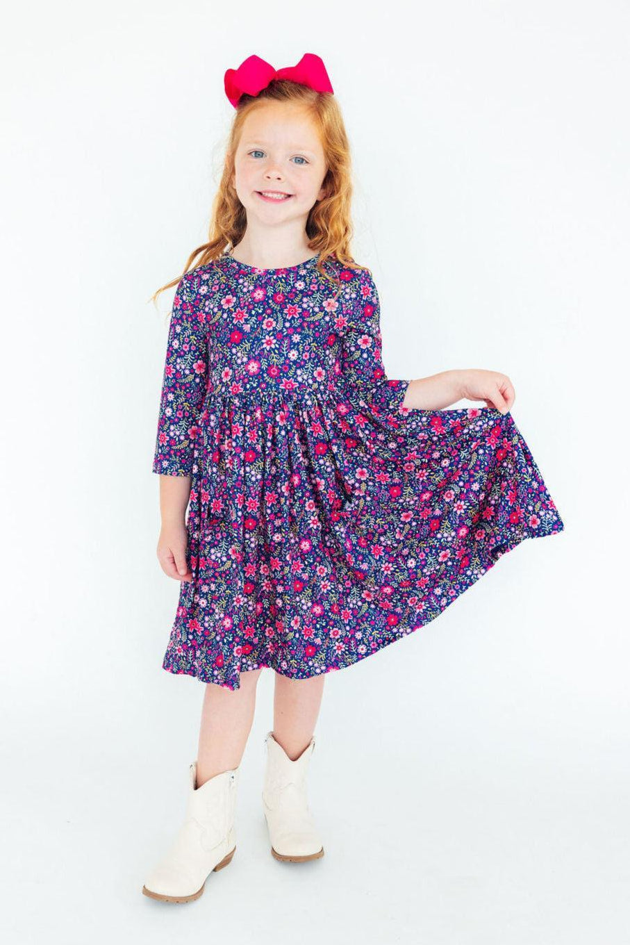 Floral twirl dress with 3/4 sleeves, navy floral print with gathered twirl skirt