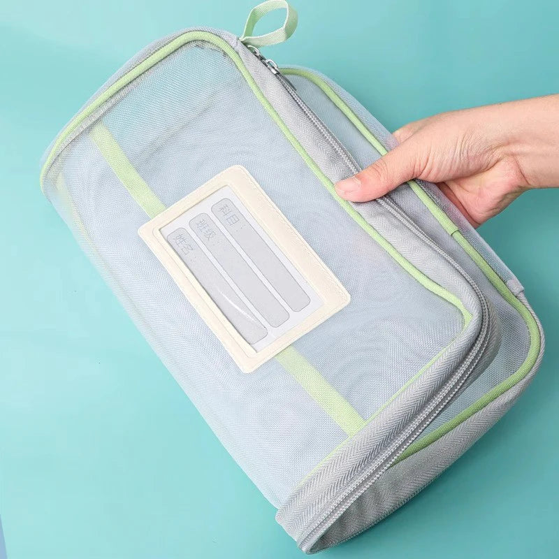Gray fabric mesh stationery zipper bag with inner label window and green trim