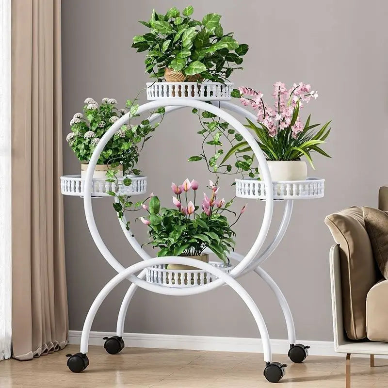White metal multi-tier circular plant stand with ring shelves and rolling casters