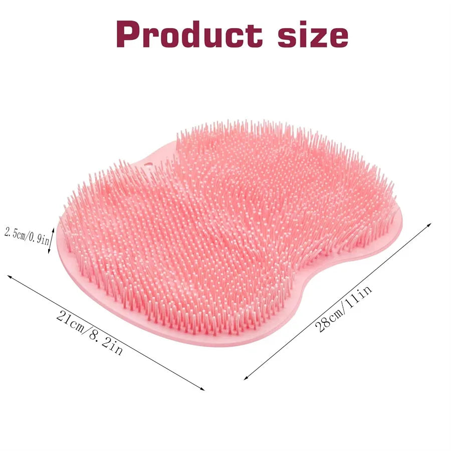 Pink shower foot scrubber mat with dense raised bristles, curved shape