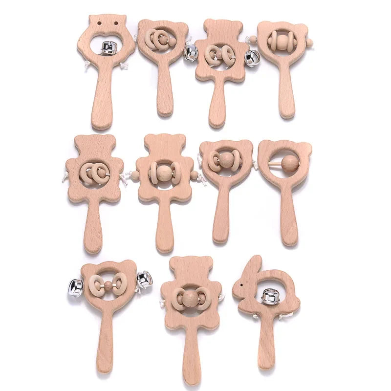 Set of beech wood animal ring teethers with small metal rattle bells