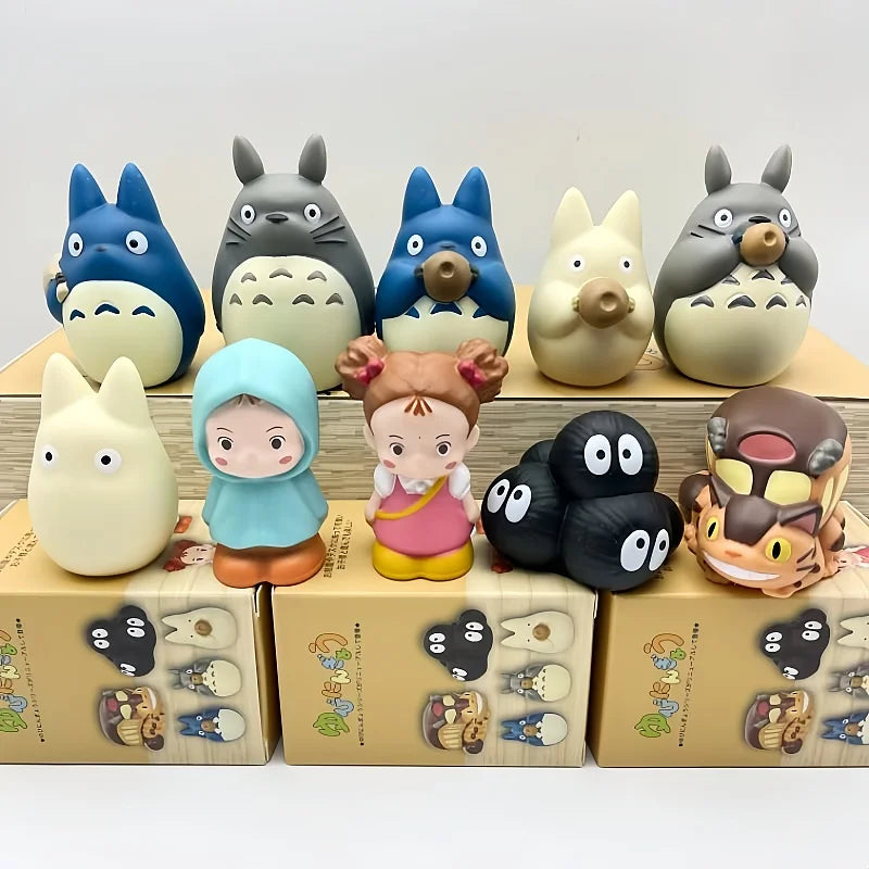 Blind box figurines set of cartoon characters in blue, gray, cream, and brown desk toys
