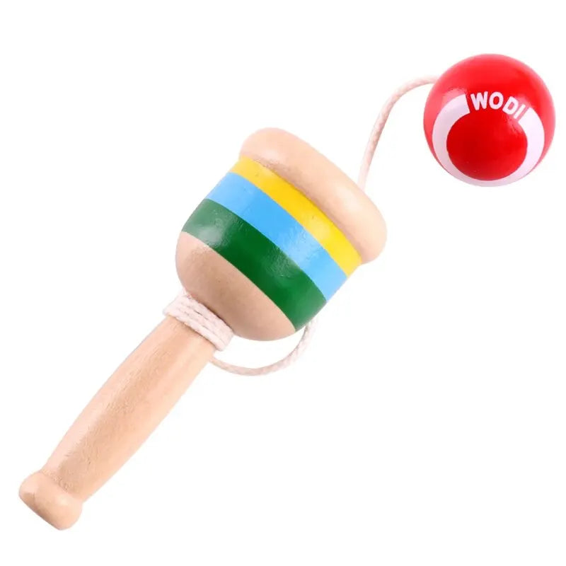 Wooden cup-and-ball throwing toy with striped wooden cup and red ball on white rope