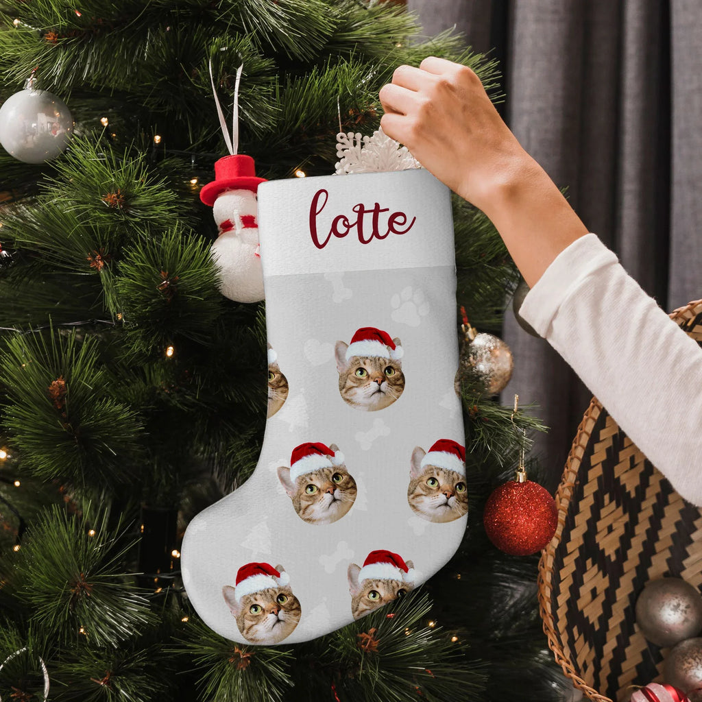 Personalized Christmas stocking with cat photo and name 'lotte'.