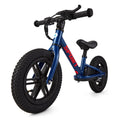 Kids balance bike with air tires, blue frame, black handlebars, seat, and front wheel