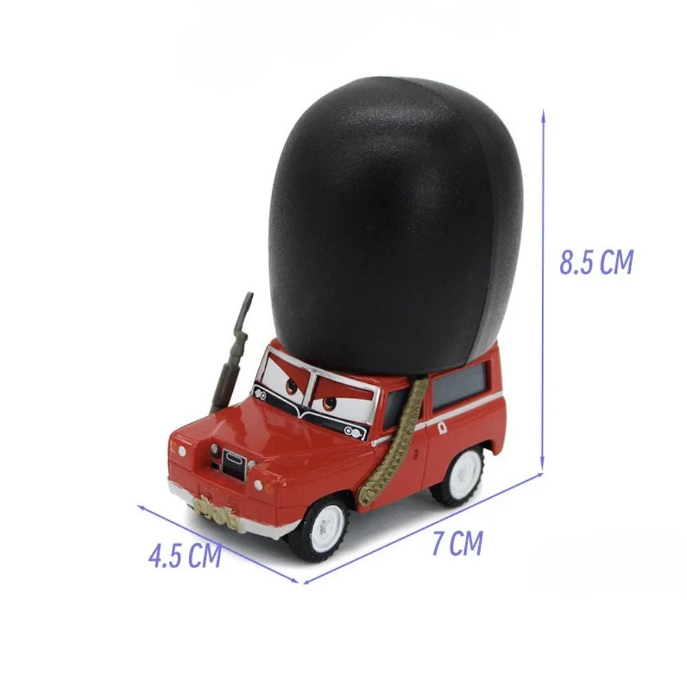 Red diecast tow truck toy with black rounded cab and white wheels