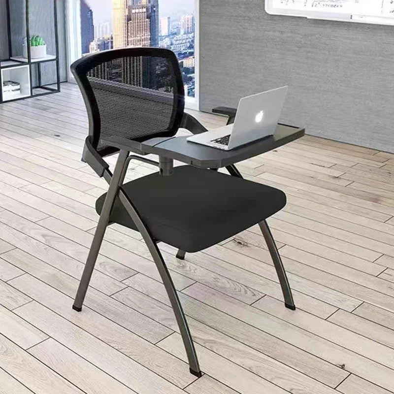 Foldable training chair with desk board, black mesh back and seat, black tabletop.