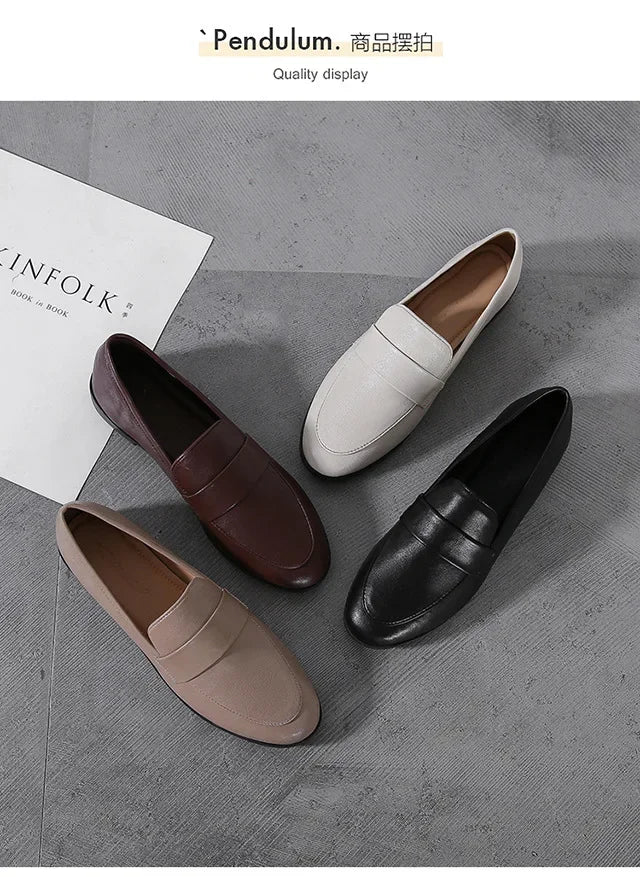 Women’s leather slip-on loafers in tan, chocolate brown, and dark brown, round toe, flat sole.