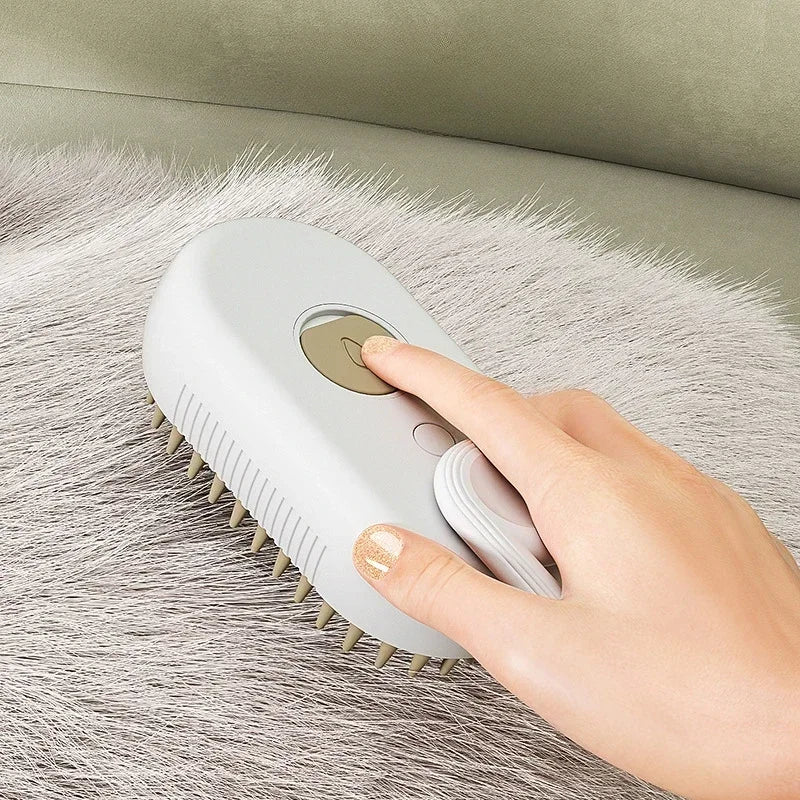 Pet steam brush sweeping white base over gray pet fur with orange bristle tips