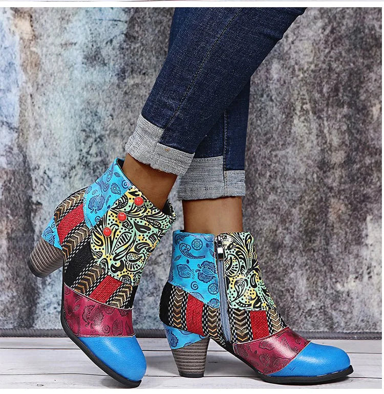 Women’s ankle boots with blue and red patchwork pattern, side zipper, and block heel.