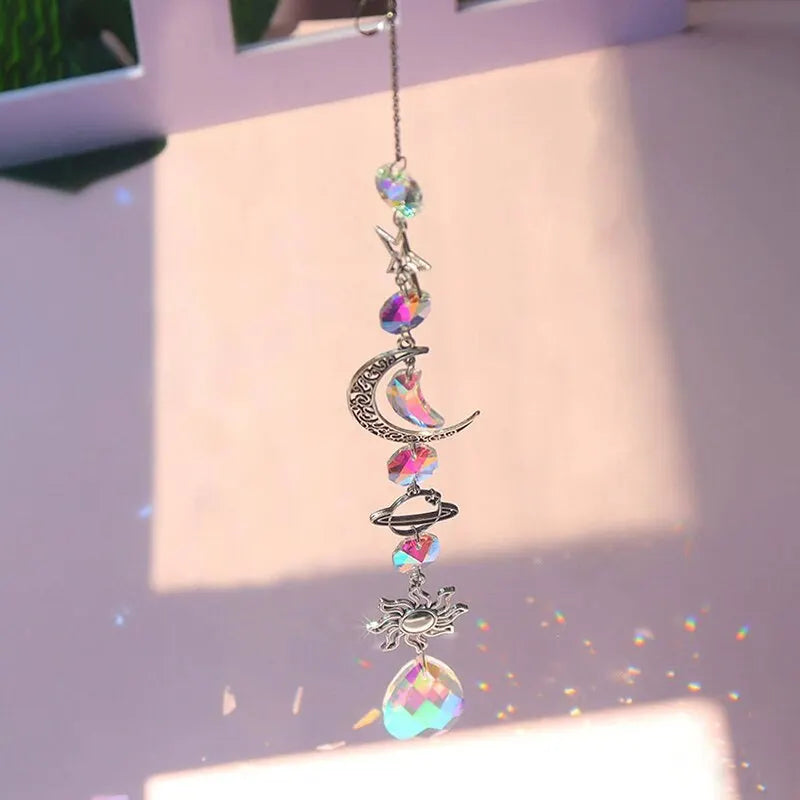 Hanging crystal wind chime with crescent moon, planet ring, sun charm and rainbow prism bead