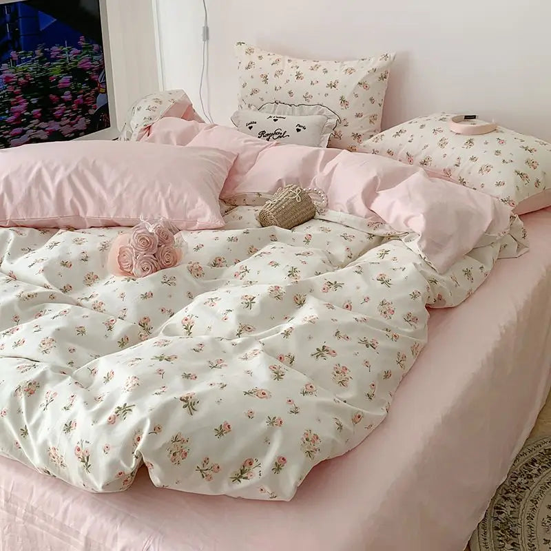Floral bedding set with duvet cover and pillows, cream base with scattered pink blooms