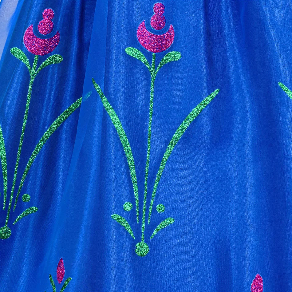 Blue dress fabric with green stems and pink flower embroidery