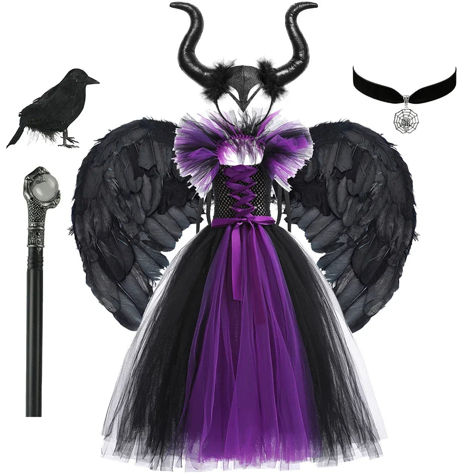 Girls black tulle dress with purple corset lacing, feather-like trim, and wing sleeves
