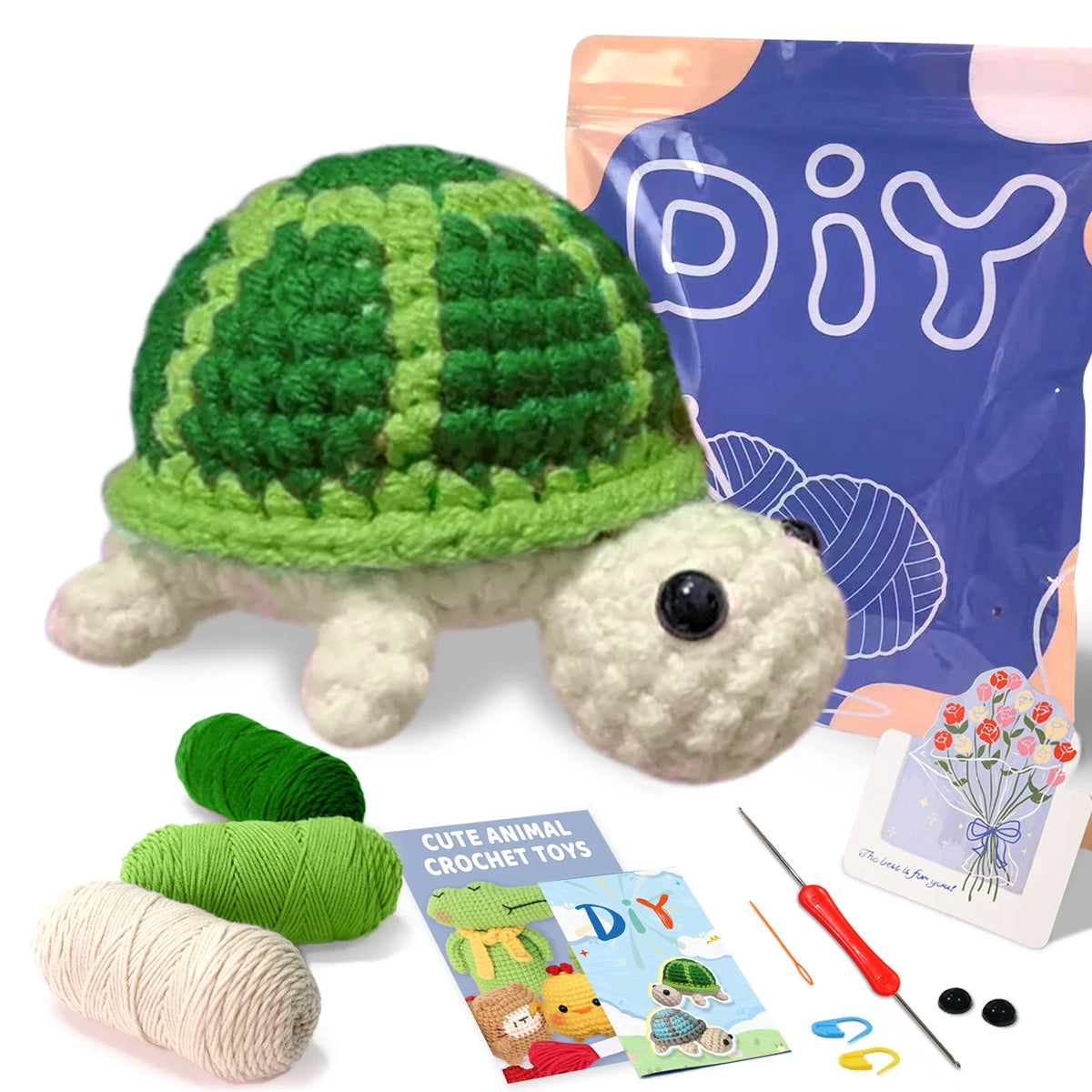 Crocheted sea turtle figure with green shell, plus yarn and DIY kit pieces