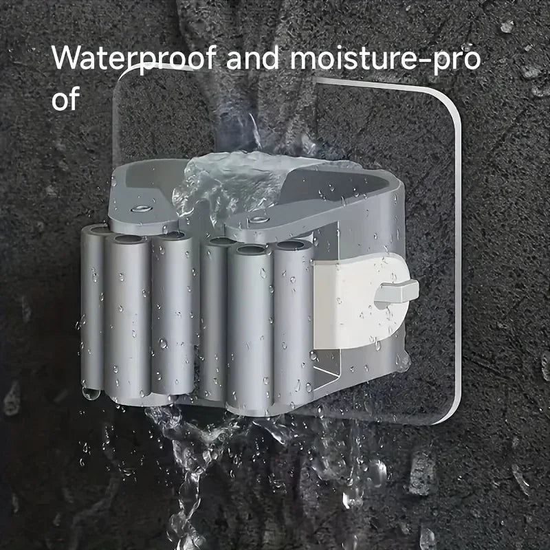 Grey wall-mounted adhesive mop and broom holder clips with multiple slots