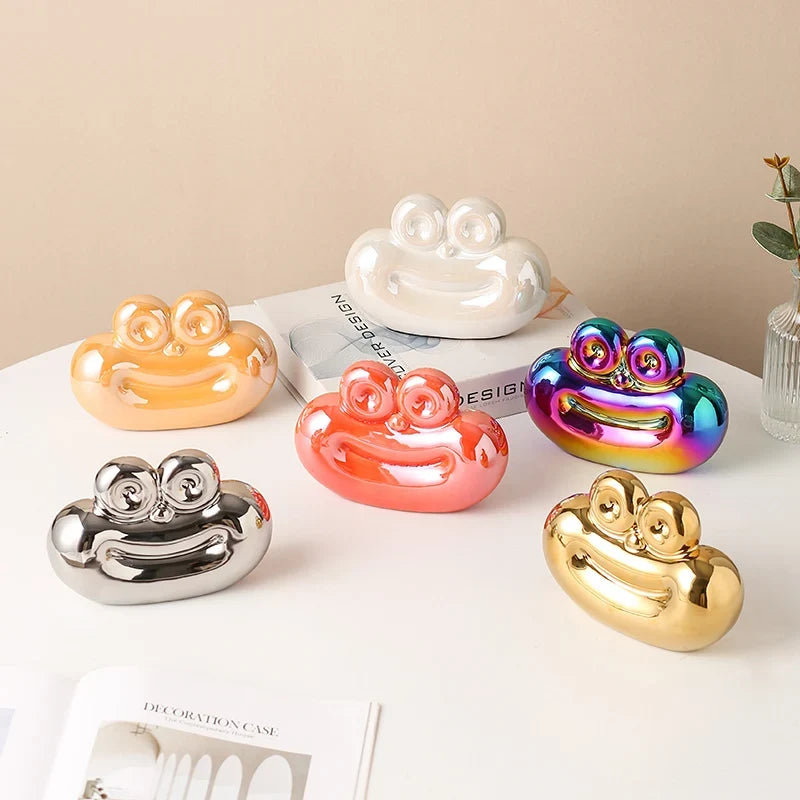 Mixed metallic sausage-shaped ceramic decorative ornaments in white, red, rainbow, gold, and silver