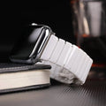 White ceramic link watch band with stainless clasp, flat links and band end details
