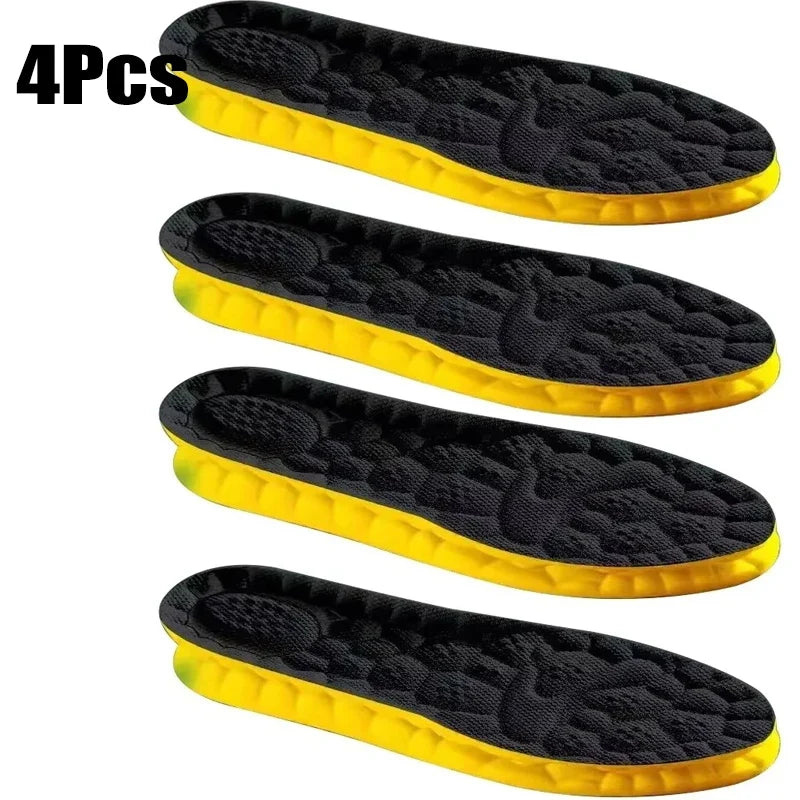 Set of 4 black sports insoles with textured cushioning and yellow outer edge