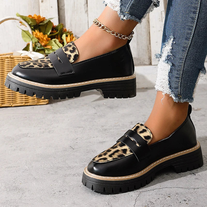 Women’s platform loafers, black with leopard-print panel, thick lug sole, slip-on style
