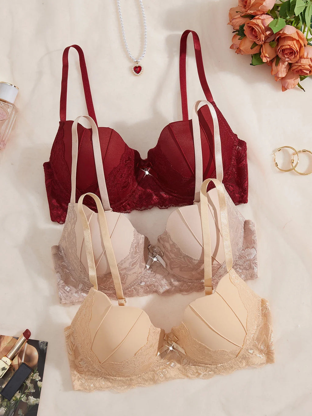 Women's 3-piece floral lace bra set with bow accents, red and cream cups