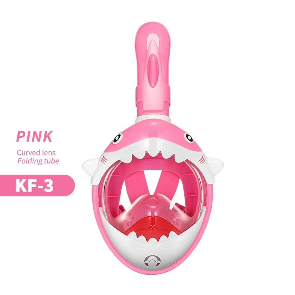 Kids pink full-face snorkeling mask with shark-style mouth graphic and clear anti-fog lens