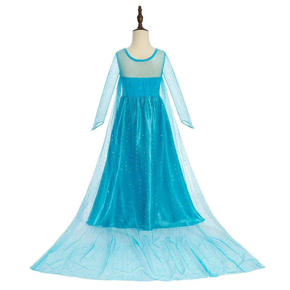 Turquoise long-sleeve princess dress with sheer dotted cape and flared skirt