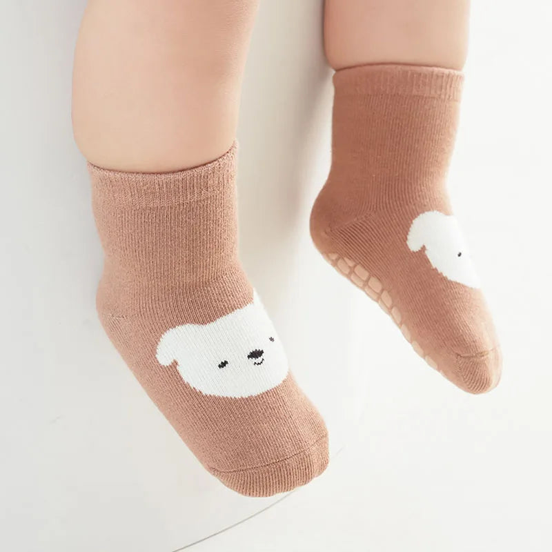 Kids tan non-slip socks with bear face and white toe/heel accents