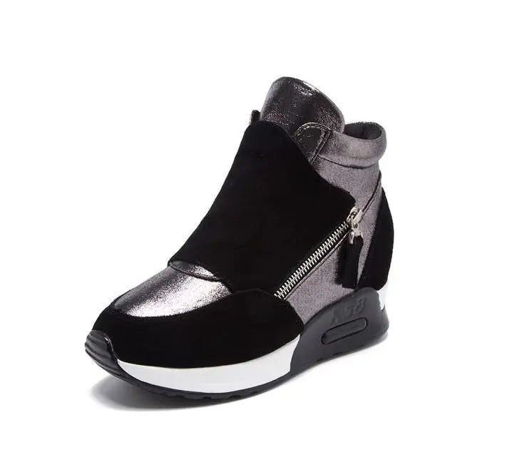 Black ankle boots with faux fur cuff, silver upper panel, side zipper, chunky sole