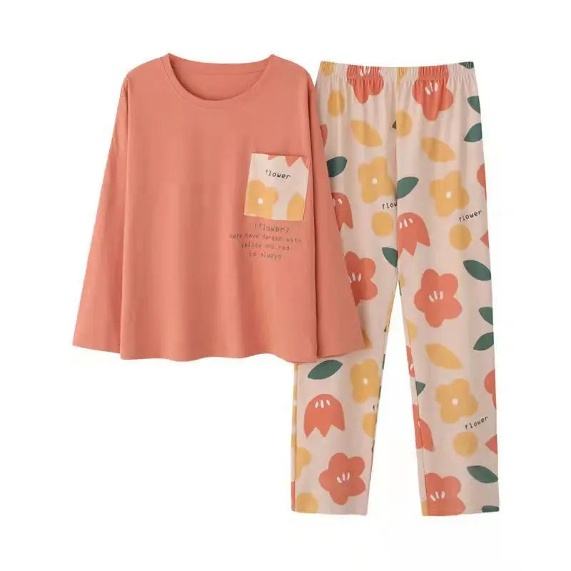 Women’s long-sleeve pajama set with coral top and floral-print pajama pants