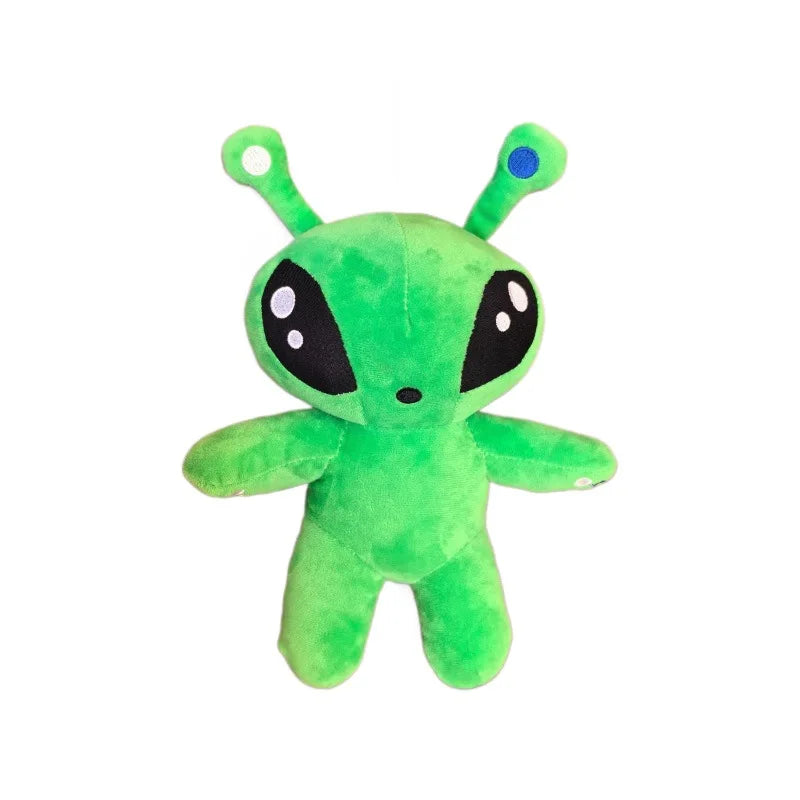 Green alien plush toy, full body isolated with horn tentacles and black eye markings