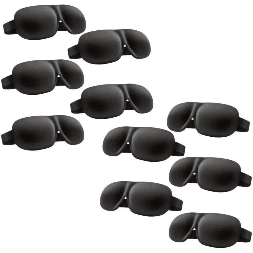 Multiple dark contoured sleep eye masks with elastic straps, assorted angles
