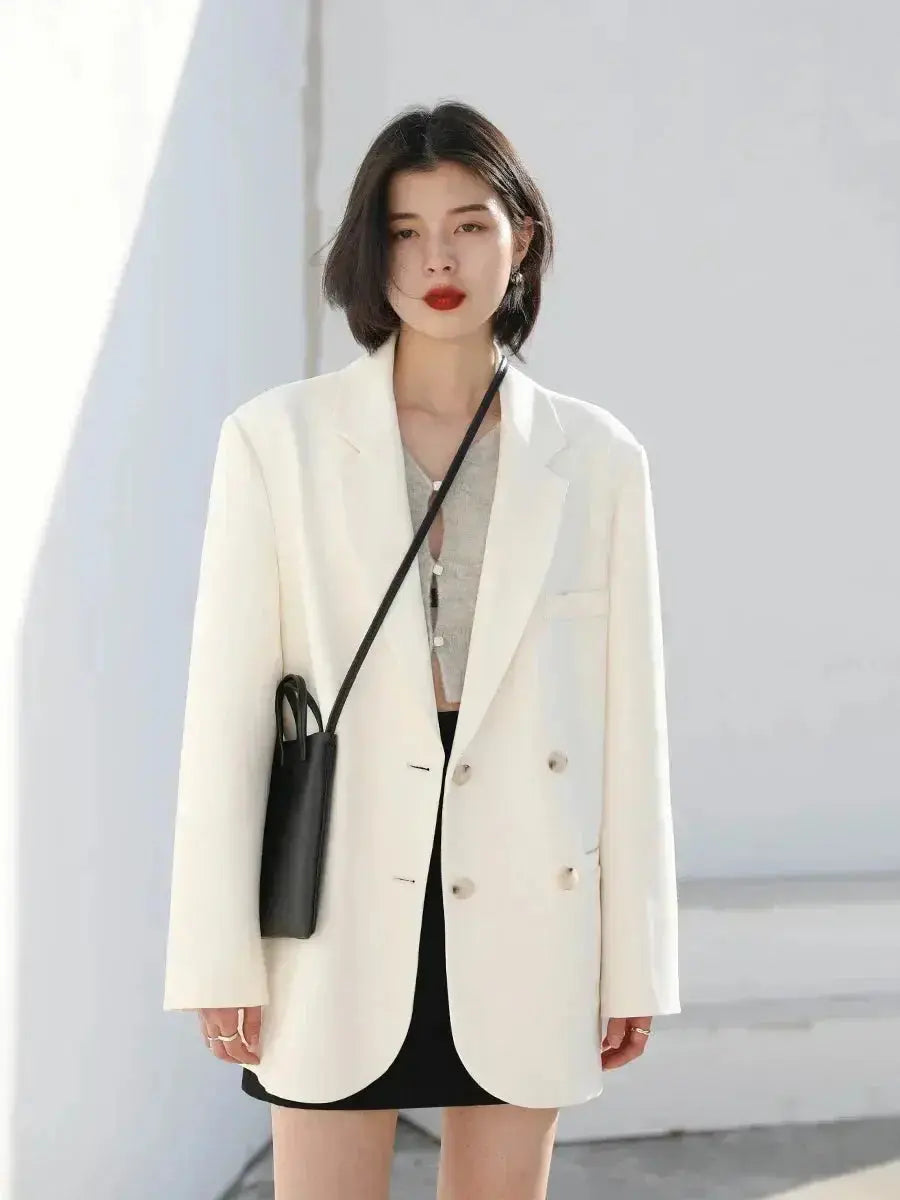 Ivory solid long-sleeve coat with double-breasted buttons and notched lapels